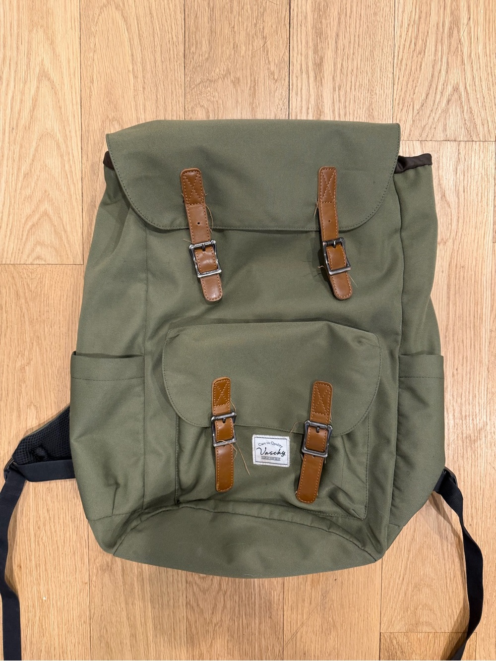 Olive Green Canvas Backpack with Brown Accents